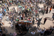 Crowds Of Syrians Mourn The Victims Of Israeli Airstrikes In Daraa.