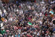 Crowds Of Syrians Mourn The Victims Of Israeli Airstrikes In Daraa.