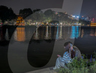 Romantic Evening By Hoan Kiem Lake In Hanoi