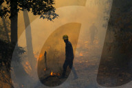 Forest Fire Rages In Nepal