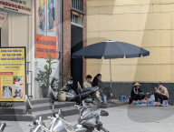 Street Food Stall And Dong Ho Folk Art Exhibit In Hanoi