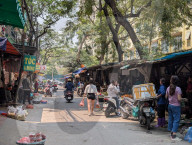 Bustling Street Market In Hanoi In A Residential Area