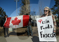 Protest Against Elon Musk At Edmonton Tesla Dealership