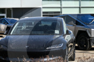 Protest Against Elon Musk At Edmonton Tesla Dealership