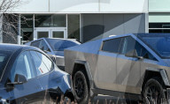 Protest Against Elon Musk At Edmonton Tesla Dealership