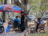 Barber By The Roadside In Vietnam
