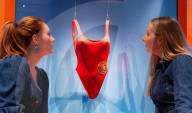 Splash! A Century of Swimming and Style exhibition and Baywatch swimsuit at the Design Museum, London, UK.