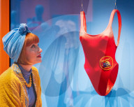 Splash! A Century of Swimming and Style exhibition and Baywatch swimsuit at the Design Museum, London, UK.