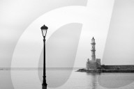 The Lighthouse Of The Old Venetian Harbour In Chania