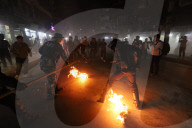 Protestors Burn Effigy Of Nepal PM KP Sharma Oli Against Decision To Depose Chief Of Electricity Authority