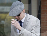 Court case following theft of Paddington Bear statue in Reading, UK.