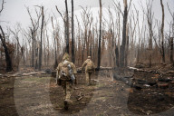 Ukrainian Volunteers Collect The Bodies Of Fallen Ukrainian And Russian Soldiers