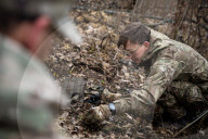 Ukrainian Volunteers Collect The Bodies Of Fallen Ukrainian And Russian Soldiers