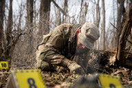 Ukrainian Volunteers Collect The Bodies Of Fallen Ukrainian And Russian Soldiers