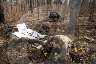 Ukrainian Volunteers Collect The Bodies Of Fallen Ukrainian And Russian Soldiers