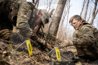 Ukrainian Volunteers Collect The Bodies Of Fallen Ukrainian And Russian Soldiers
