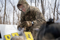 Ukrainian Volunteers Collect The Bodies Of Fallen Ukrainian And Russian Soldiers