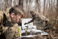 Ukrainian Volunteers Collect The Bodies Of Fallen Ukrainian And Russian Soldiers