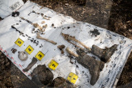 Ukrainian Volunteers Collect The Bodies Of Fallen Ukrainian And Russian Soldiers