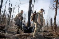 Ukrainian Volunteers Collect The Bodies Of Fallen Ukrainian And Russian Soldiers