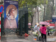 Street Vendors Sell Flowers In Hanoi