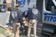 NYPD Crime Scene Unit Investigators Collect Evidence At Home On 196th Street In St. Albans Queens New York Of Suspect Accused Of Shooting And Killing 16-year-old Boy Sincere Jazmin