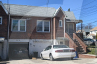 NYPD Crime Scene Unit Investigators Collect Evidence At Home On 196th Street In St. Albans Queens New York Of Suspect Accused Of Shooting And Killing 16-year-old Boy Sincere Jazmin