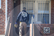 NYPD Crime Scene Unit Investigators Collect Evidence At Home On 196th Street In St. Albans Queens New York Of Suspect Accused Of Shooting And Killing 16-year-old Boy Sincere Jazmin