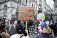 Welfare campaigners gather in Whitehall, London, UK.