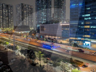 Nighttime Traffic Flows Along An Elevated Highway In Hanoi