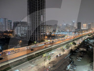 Nighttime Traffic Flows Along An Elevated Highway In Hanoi
