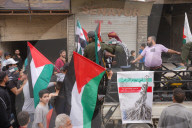 Activists In Yarmouk Camp Organize Solidarity Vigil For Gaza