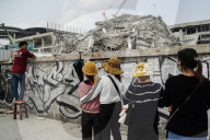 Rescue Operations In Bangkok's Collapsed Building Following A 7.7 Magnitude.