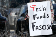 Protest Against Elon Musk At Edmonton Tesla Dealership