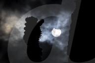 Partial Solar Eclipse Over The Temple Of The Sagrada Familia