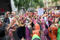 Garments Workers Hunger March With Utensils In Hand In Dhaka.