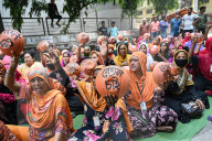 Garments Workers Hunger March With Utensils In Hand In Dhaka.