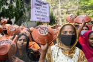 Garments Workers Hunger March With Utensils In Hand In Dhaka.