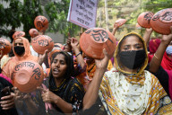 Garments Workers Hunger March With Utensils In Hand In Dhaka.