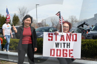 Pro-Elon Musk And Tesla Protesters And Anti-Elon Musk And Tesla Protesters Demonstrate At Tesla Dealership On Route 17 North In Paramus New Jersey