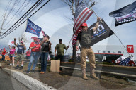 Pro-Elon Musk And Tesla Protesters And Anti-Elon Musk And Tesla Protesters Demonstrate At Tesla Dealership On Route 17 North In Paramus New Jersey