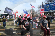 Pro-Elon Musk And Tesla Protesters And Anti-Elon Musk And Tesla Protesters Demonstrate At Tesla Dealership On Route 17 North In Paramus New Jersey