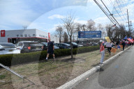 Pro-Elon Musk And Tesla Protesters And Anti-Elon Musk And Tesla Protesters Demonstrate At Tesla Dealership On Route 17 North In Paramus New Jersey