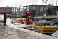 DHL Delivery Boat At A Pier In Venice