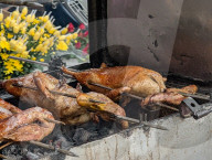 Ducks Roasted Over Charcoal At A Street Stall In Vietnam