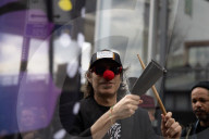 Activists Gather At NYC AIDS Memorial And March To Tesla Dealership For ‚ÄúTesla Takedown‚Äù Rally To Protest DOGE Cuts