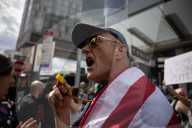 Activists Gather At NYC AIDS Memorial And March To Tesla Dealership For ‚ÄúTesla Takedown‚Äù Rally To Protest DOGE Cuts