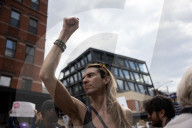 Activists Gather At NYC AIDS Memorial And March To Tesla Dealership For ‚ÄúTesla Takedown‚Äù Rally To Protest DOGE Cuts