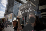 Activists Gather At NYC AIDS Memorial And March To Tesla Dealership For ‚ÄúTesla Takedown‚Äù Rally To Protest DOGE Cuts