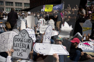 Activists Gather At NYC AIDS Memorial And March To Tesla Dealership For ‚ÄúTesla Takedown‚Äù Rally To Protest DOGE Cuts